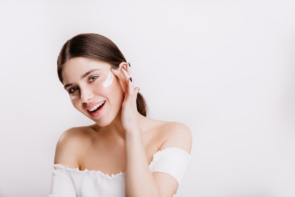 Woman with healthy, glowing skin after microneedling and PRP combination skin rejuvenation treatment
